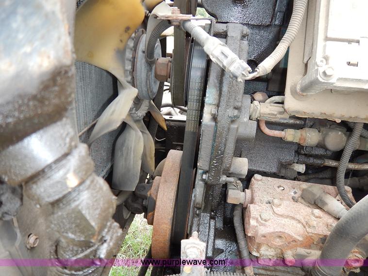 image for item J6377 2002 International 4900 Crew Cab dump truck