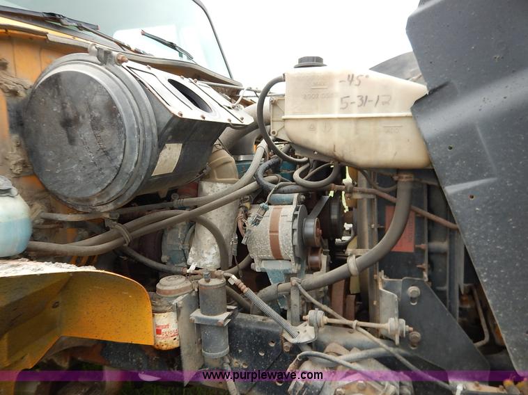 image for item J6377 2002 International 4900 Crew Cab dump truck