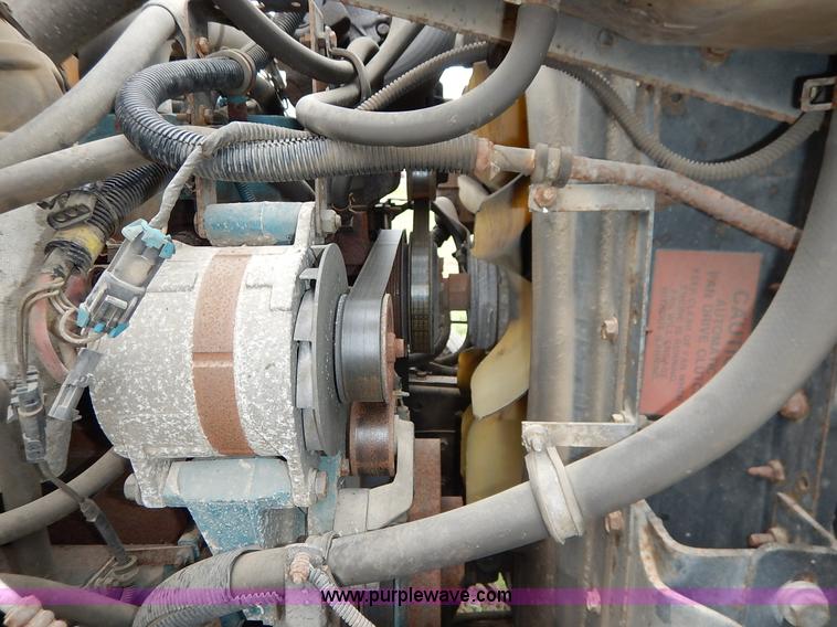 image for item J6377 2002 International 4900 Crew Cab dump truck