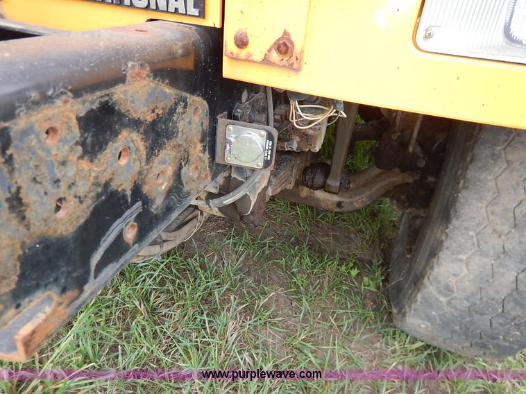 image for item J6377 2002 International 4900 Crew Cab dump truck