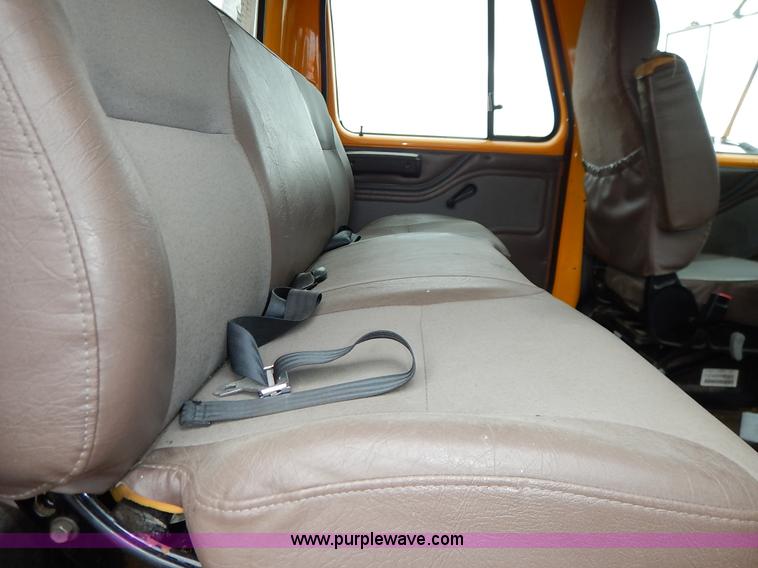 image for item J6377 2002 International 4900 Crew Cab dump truck