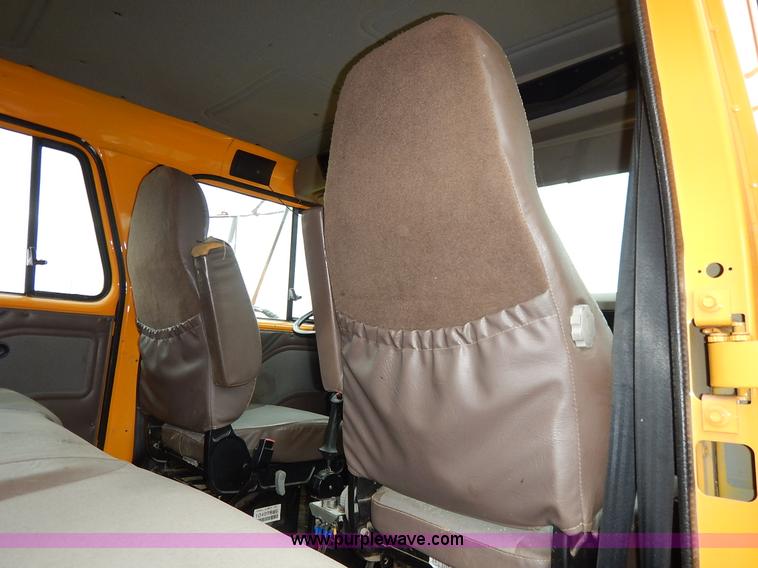 image for item J6377 2002 International 4900 Crew Cab dump truck