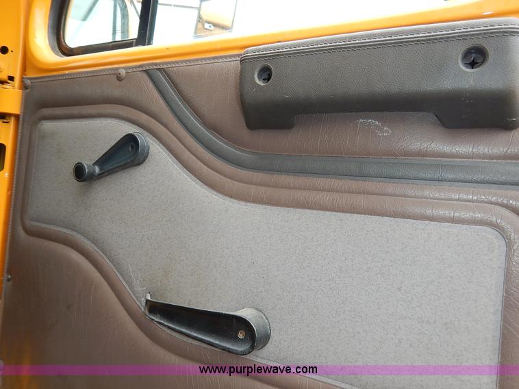 image for item J6377 2002 International 4900 Crew Cab dump truck