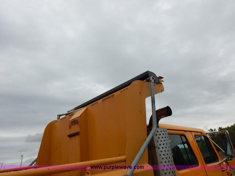image for item J6377 2002 International 4900 Crew Cab dump truck