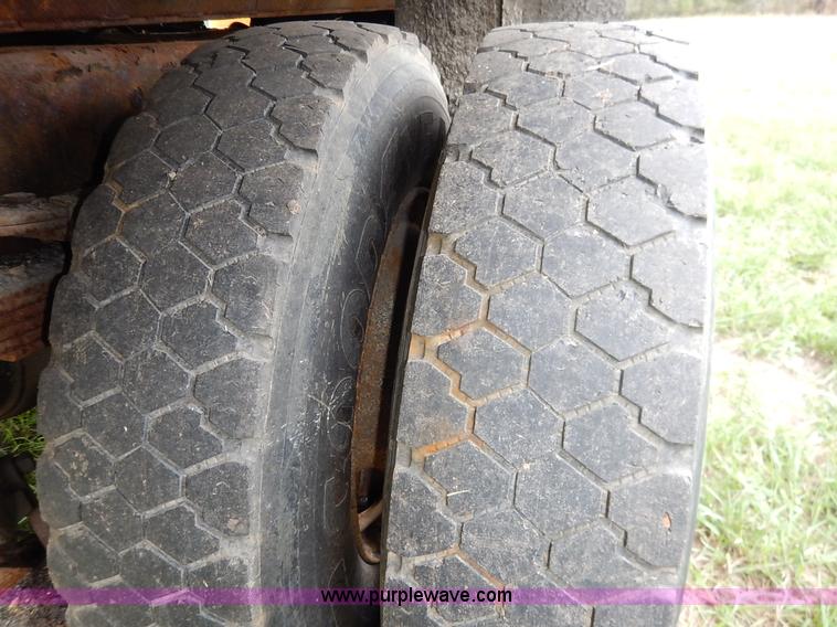 image for item J6377 2002 International 4900 Crew Cab dump truck