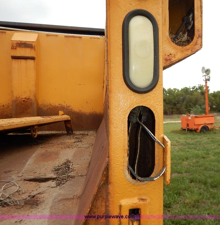 image for item J6377 2002 International 4900 Crew Cab dump truck