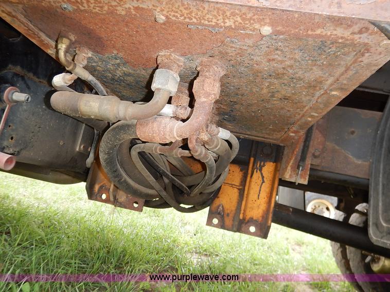 image for item J6377 2002 International 4900 Crew Cab dump truck