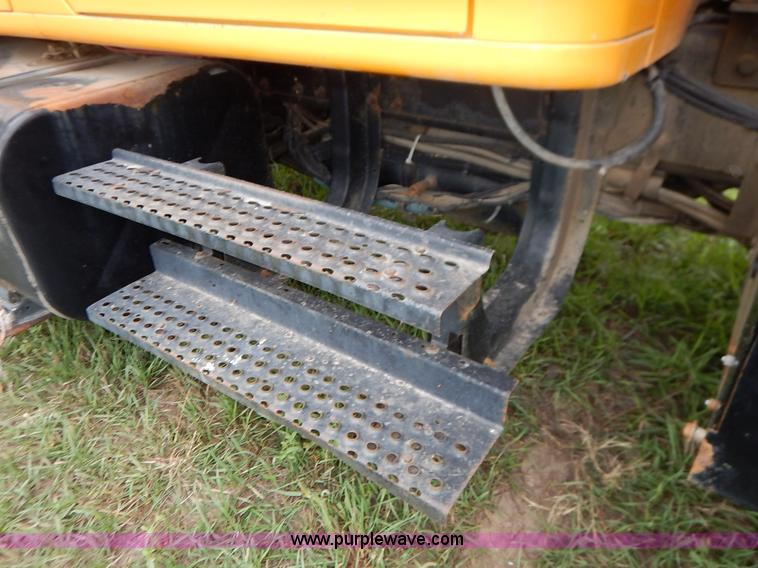 image for item J6377 2002 International 4900 Crew Cab dump truck