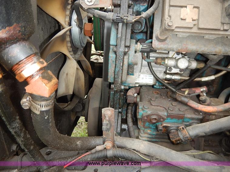 image for item J6378 2002 International 4900 Crew Cab dump truck