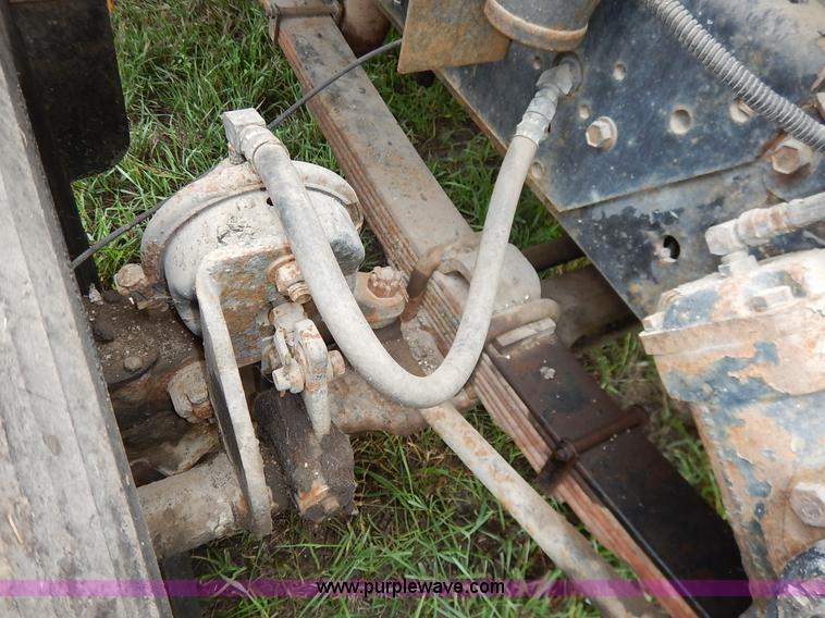 image for item J6378 2002 International 4900 Crew Cab dump truck