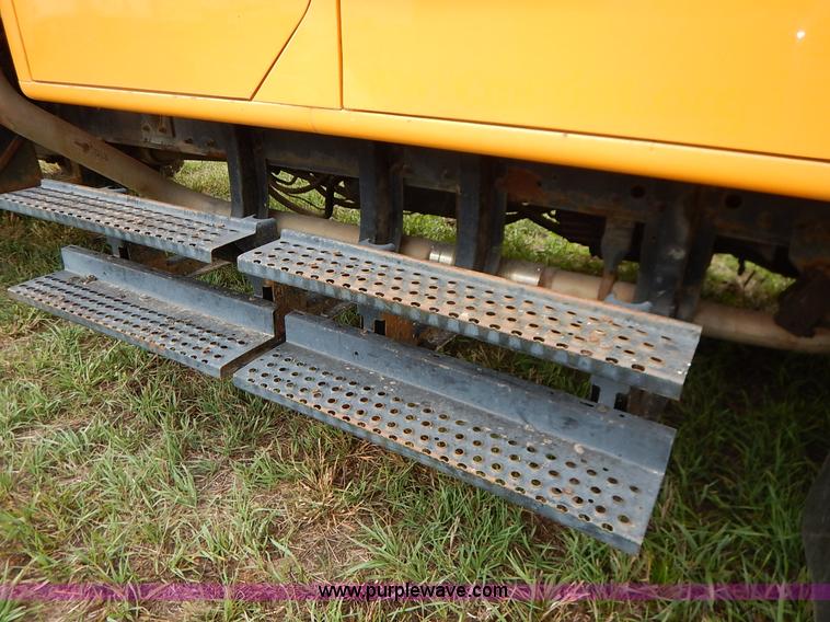 image for item J6378 2002 International 4900 Crew Cab dump truck