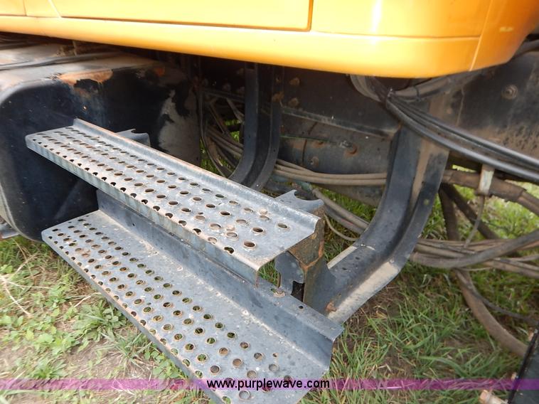 image for item J6378 2002 International 4900 Crew Cab dump truck