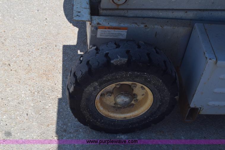 image for item J7230 1997 Mec 2548 HT scissor lift