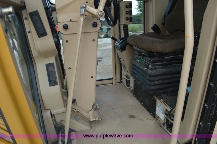 image for item J8684 2006 Caterpillar 120H motor grader