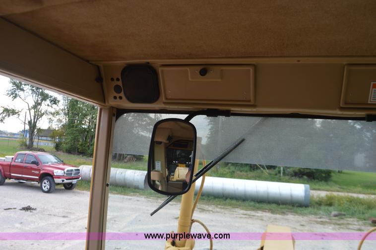 image for item J8684 2006 Caterpillar 120H motor grader