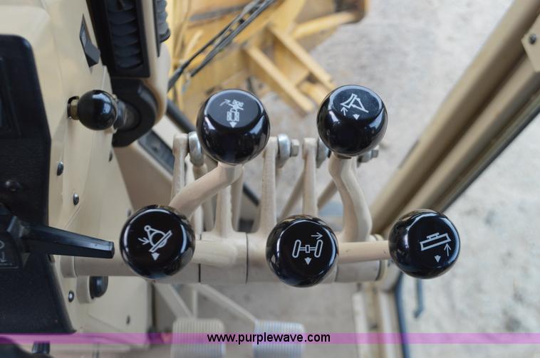 image for item J8684 2006 Caterpillar 120H motor grader