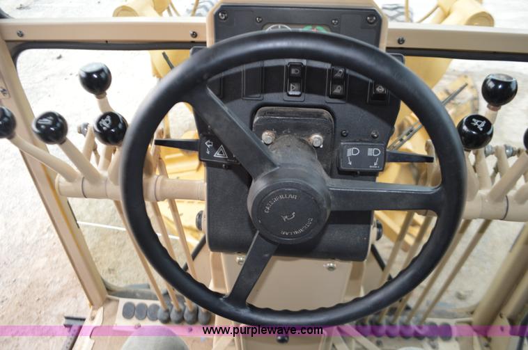 image for item J8684 2006 Caterpillar 120H motor grader