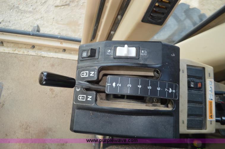 image for item J8684 2006 Caterpillar 120H motor grader