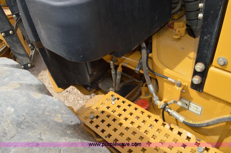 image for item J8697 2010 Caterpillar 140M motor grader