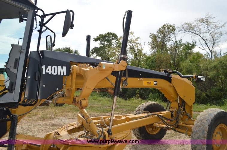 image for item J8697 2010 Caterpillar 140M motor grader