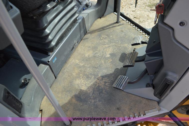 image for item J8697 2010 Caterpillar 140M motor grader