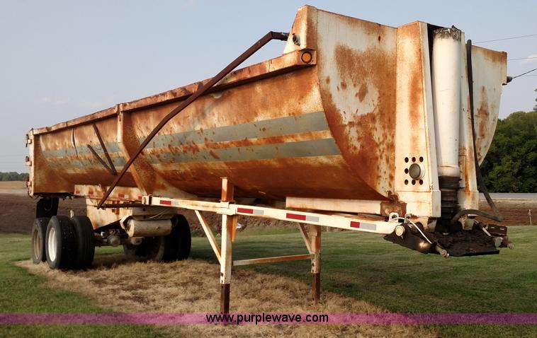 image for item K1135 1987 Clement end dump barrel trailer
