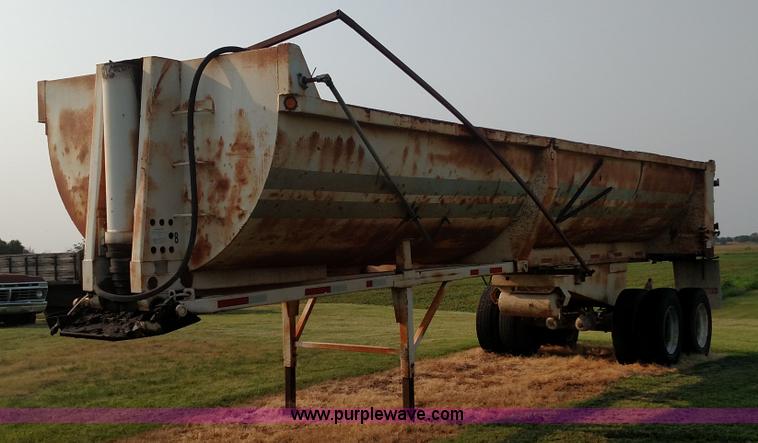 image for item K1135 1987 Clement end dump barrel trailer