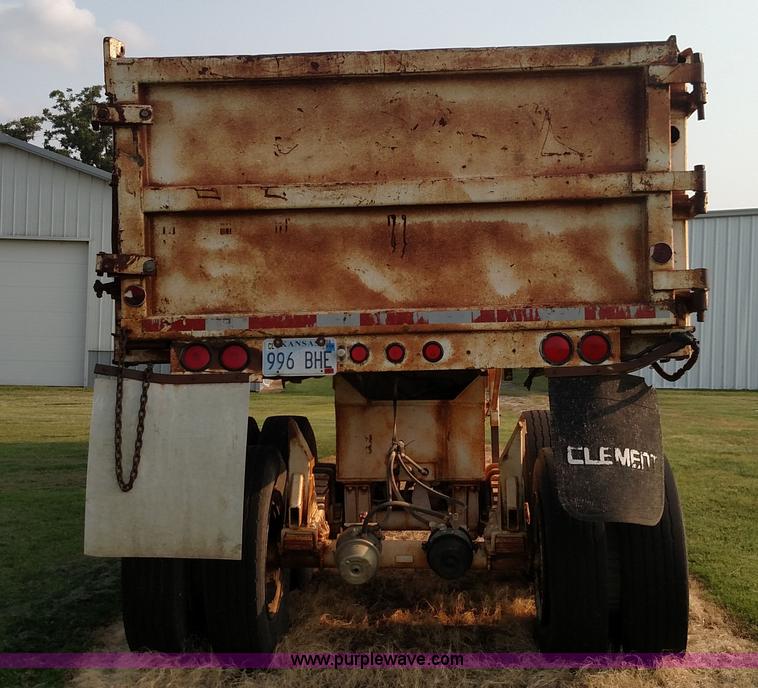 image for item K1135 1987 Clement end dump barrel trailer