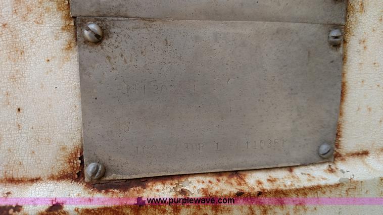 image for item K1135 1987 Clement end dump barrel trailer