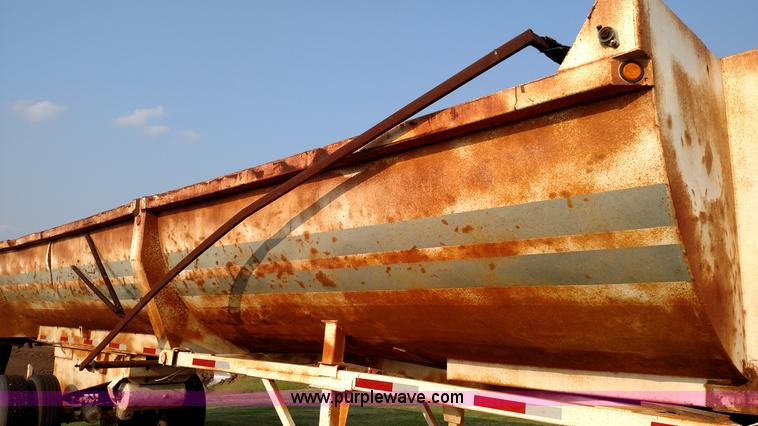 image for item K1135 1987 Clement end dump barrel trailer