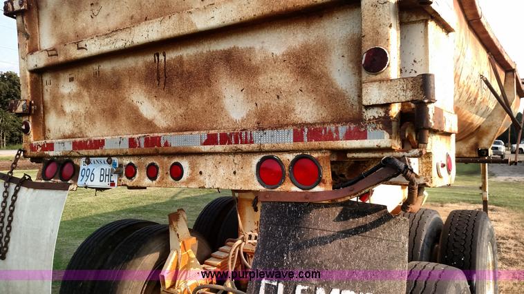 image for item K1135 1987 Clement end dump barrel trailer