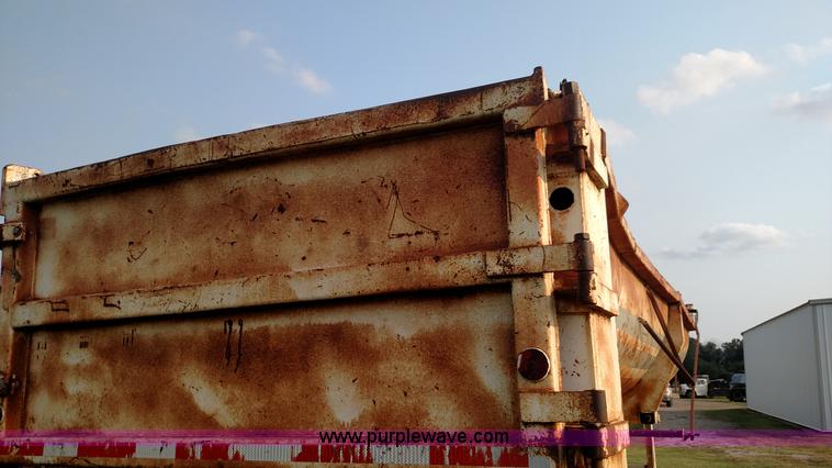 image for item K1135 1987 Clement end dump barrel trailer