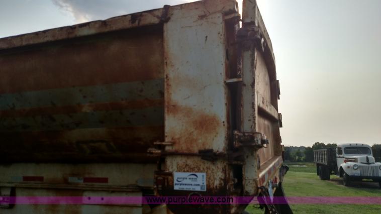 image for item K1135 1987 Clement end dump barrel trailer