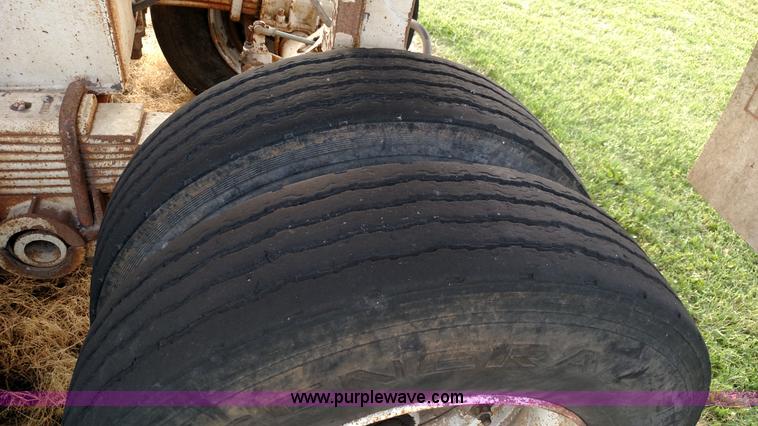 image for item K1135 1987 Clement end dump barrel trailer