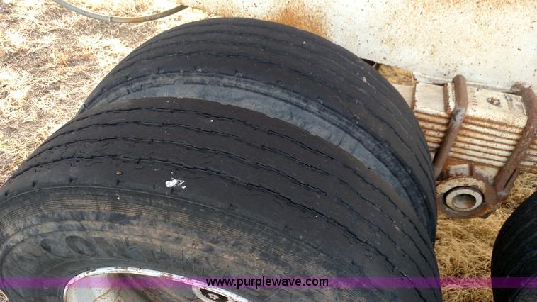 image for item K1135 1987 Clement end dump barrel trailer