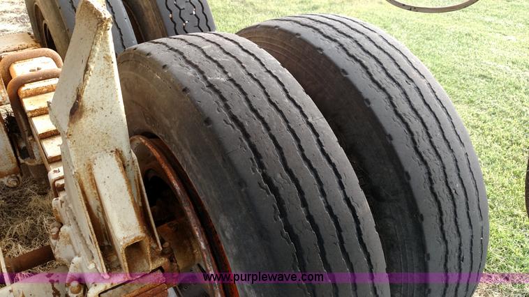 image for item K1135 1987 Clement end dump barrel trailer