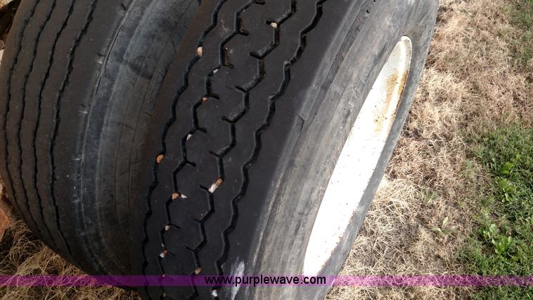 image for item K1135 1987 Clement end dump barrel trailer