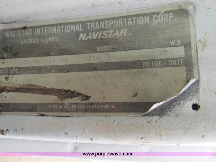 image for item K5174 1989 International 1754 Crew Cab flatbed truck