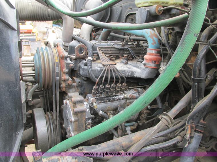 image for item K5174 1989 International 1754 Crew Cab flatbed truck