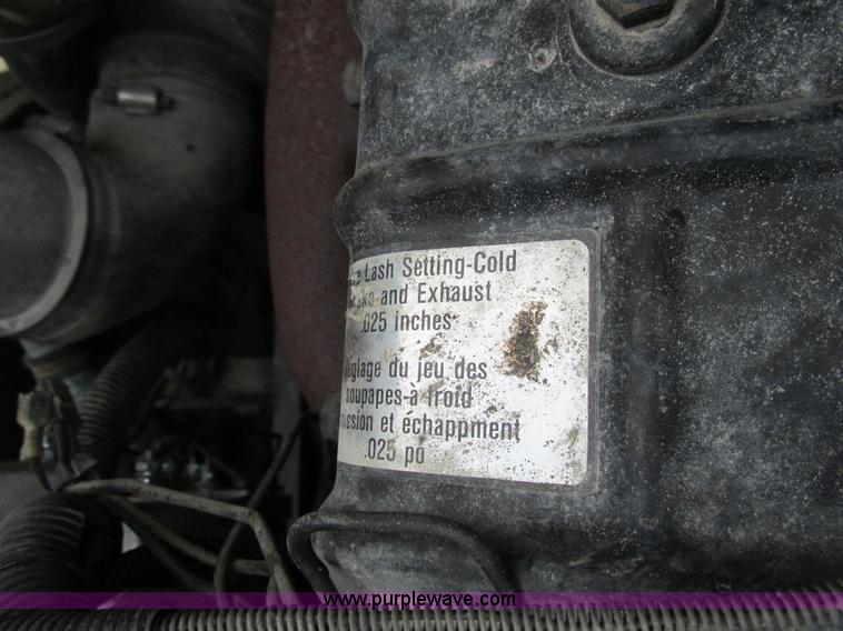 image for item K5174 1989 International 1754 Crew Cab flatbed truck