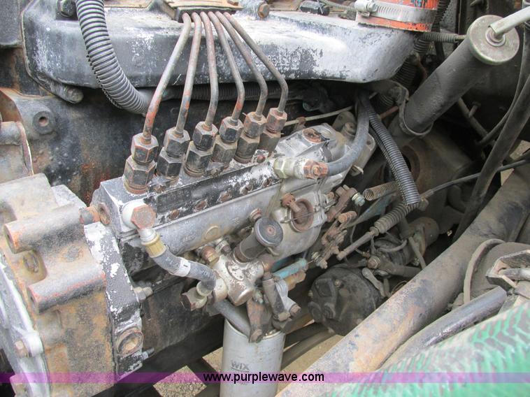 image for item K5174 1989 International 1754 Crew Cab flatbed truck