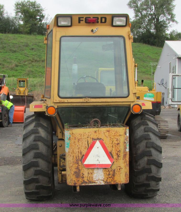 image for item L3834 Ford 555B landscape tractor