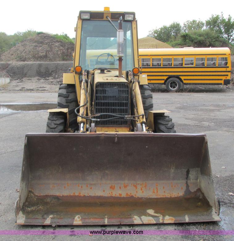 image for item L3834 Ford 555B landscape tractor