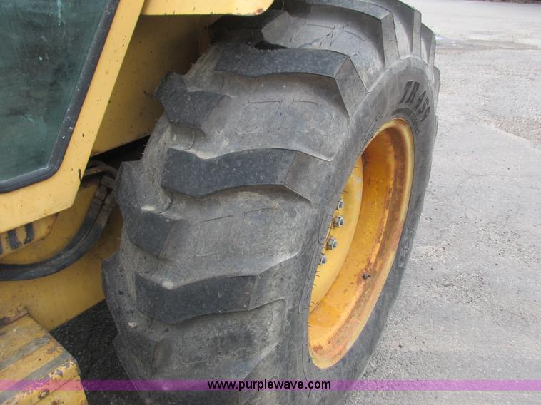 image for item L3834 Ford 555B landscape tractor