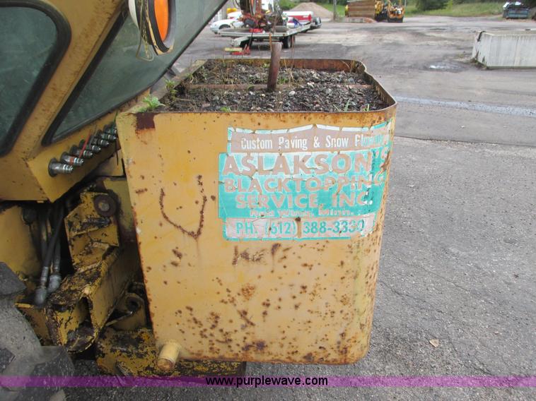 image for item L3834 Ford 555B landscape tractor