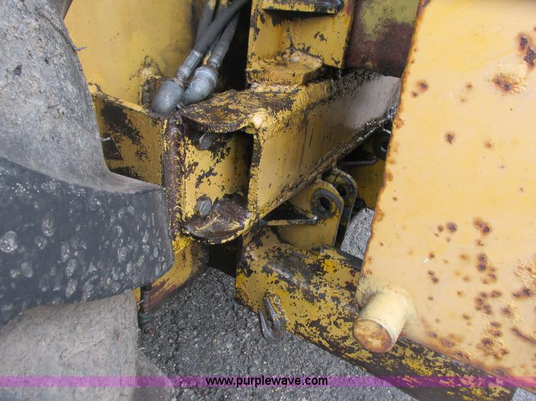 image for item L3834 Ford 555B landscape tractor