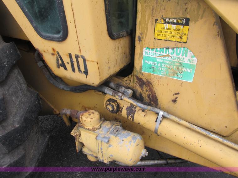 image for item L3834 Ford 555B landscape tractor