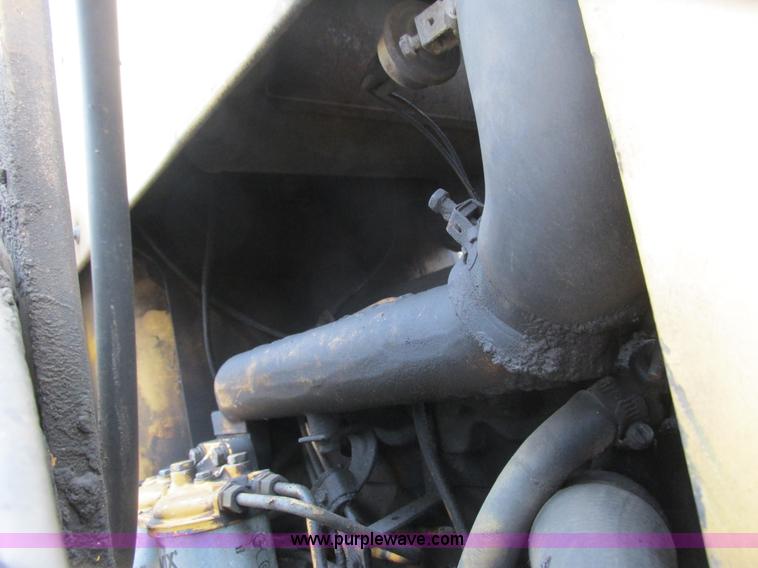 image for item L3834 Ford 555B landscape tractor