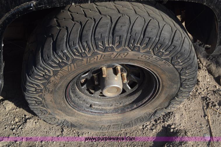 image for item J8009 1999 GMC Yukon SLE SUV