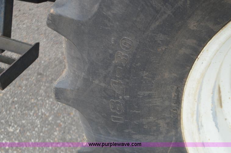 image for item L6392 1997 Ford New Holland 6640SL tractor